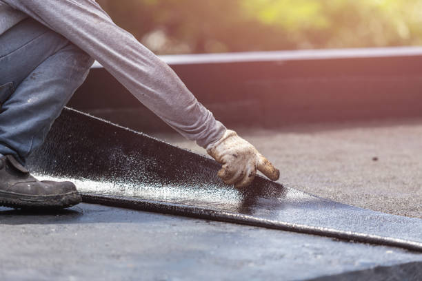 Professional Basement Waterproofing technician working in Coleman, WI